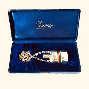 Authentic Gucci perfume holder pendant.